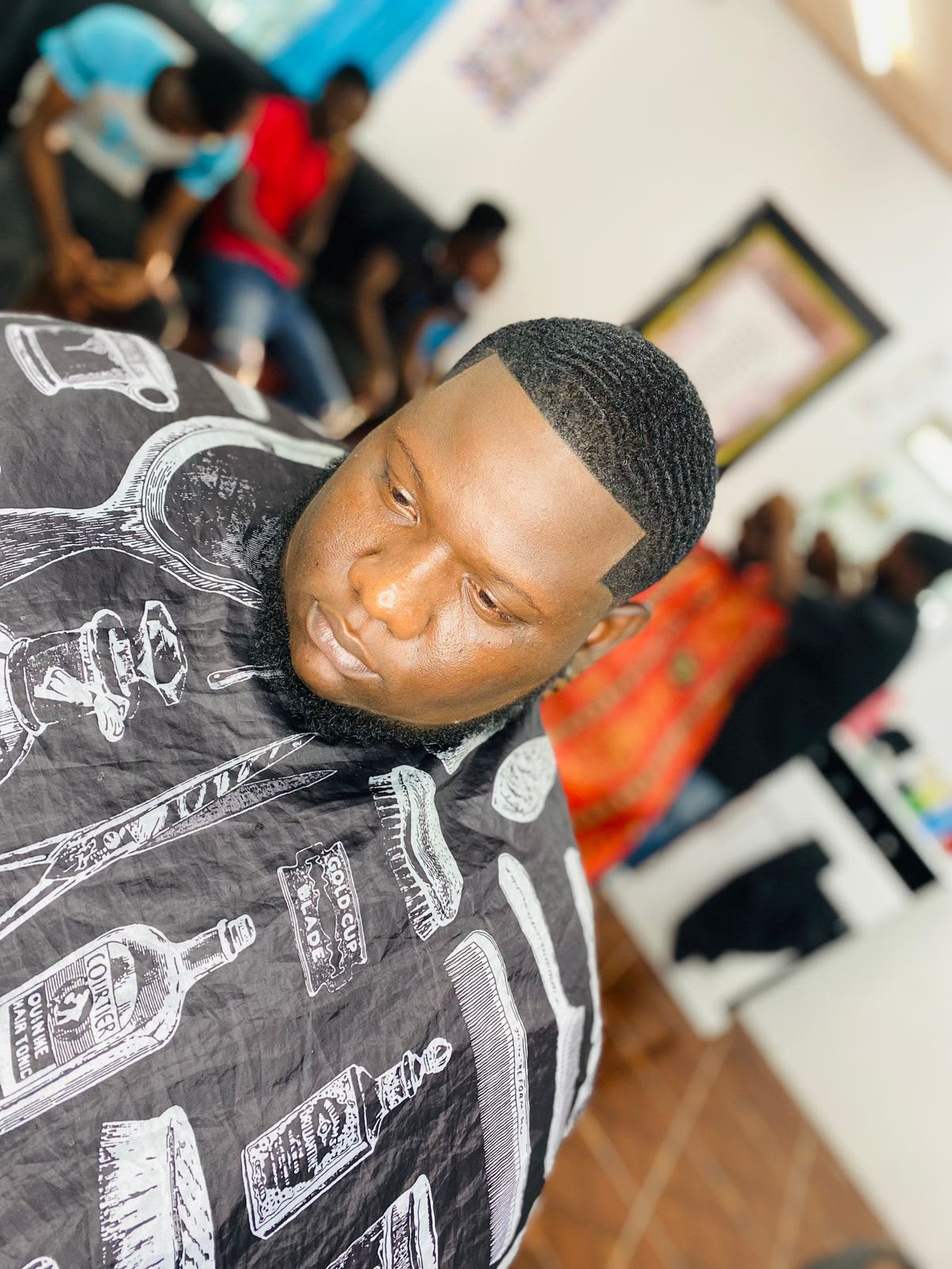 Wave haircut with crisp front lineup